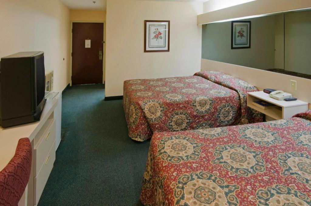 America'S Best Value Inn & Suites-МакДона Екстериор снимка