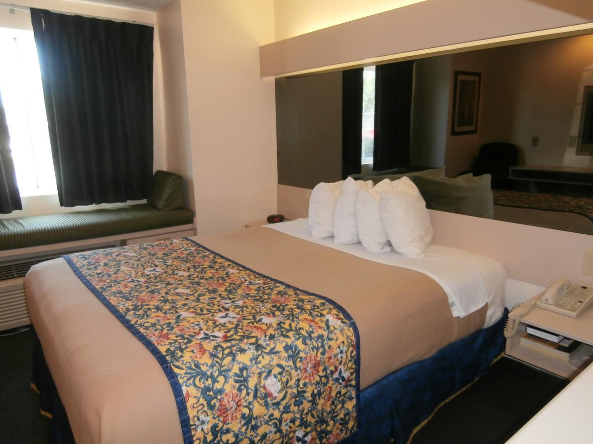 America'S Best Value Inn & Suites-МакДона Екстериор снимка