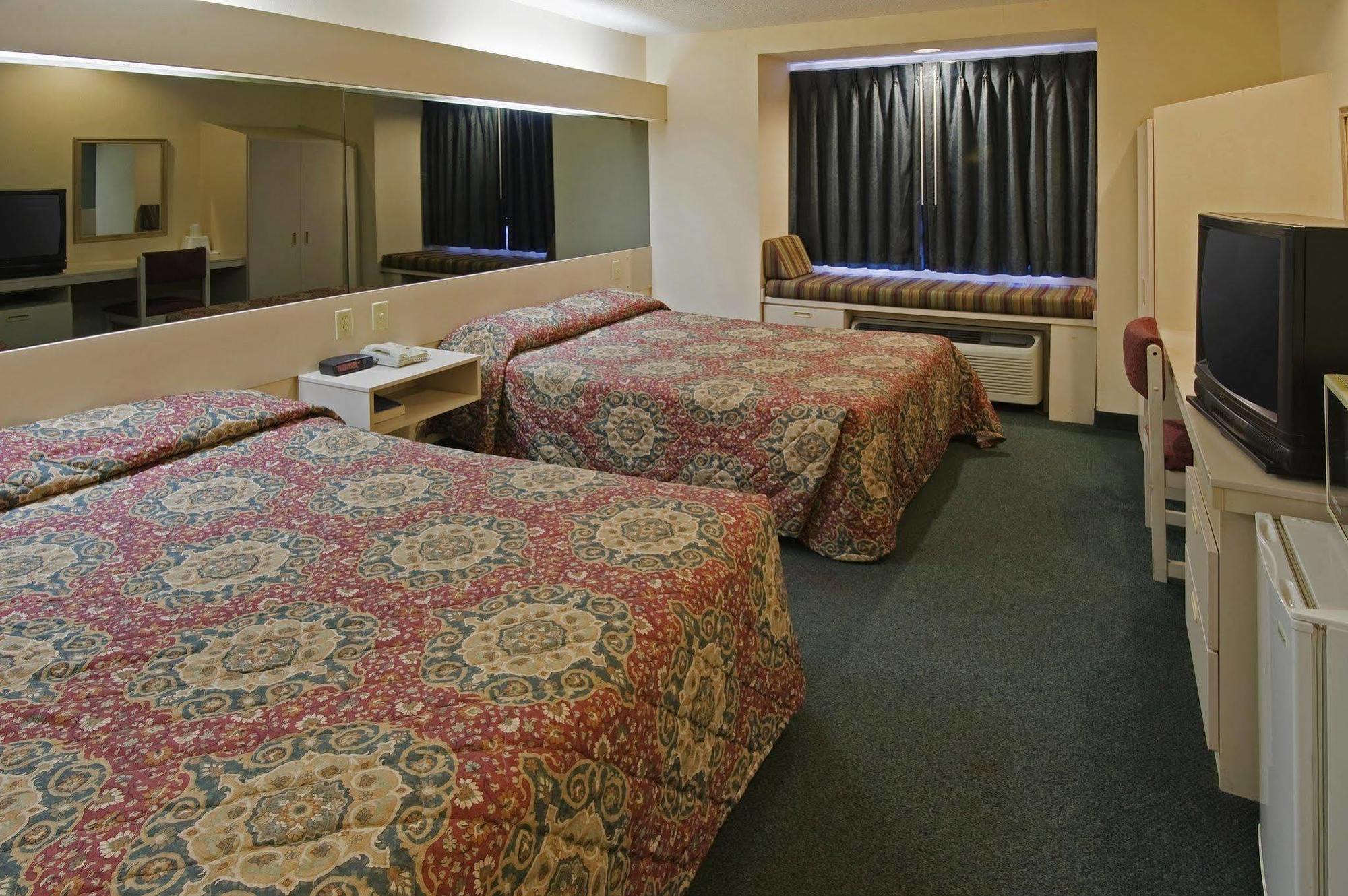 America'S Best Value Inn & Suites-МакДона Екстериор снимка